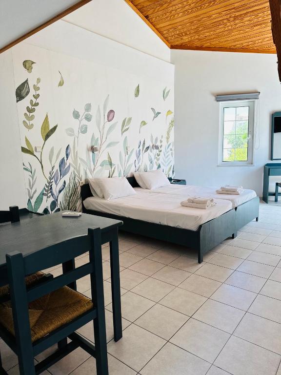 Postel nebo postele na pokoji v ubytování Cost Mari Almyrida New by ZAGO Boutiqe hotels