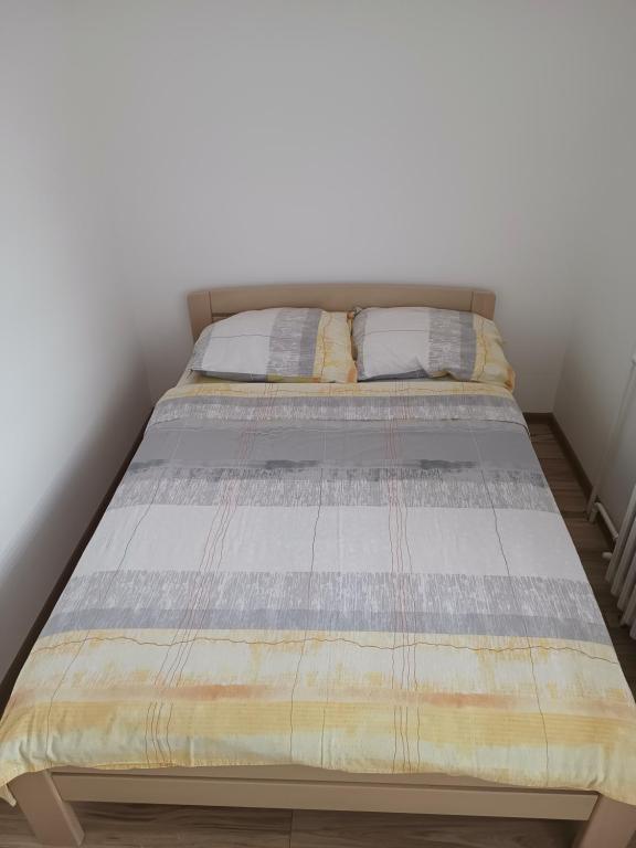 Postel nebo postele na pokoji v ubytování stan na dan IM
