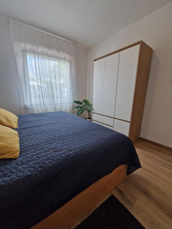 Postel nebo postele na pokoji v ubytování Medeni Apartma