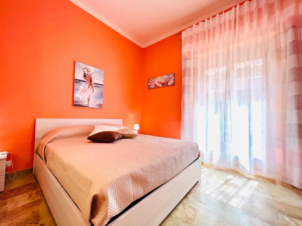 Postel nebo postele na pokoji v ubytování Domus Aurea