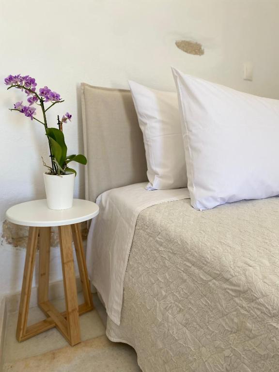 Postel nebo postele na pokoji v ubytování Aegean Breeze House