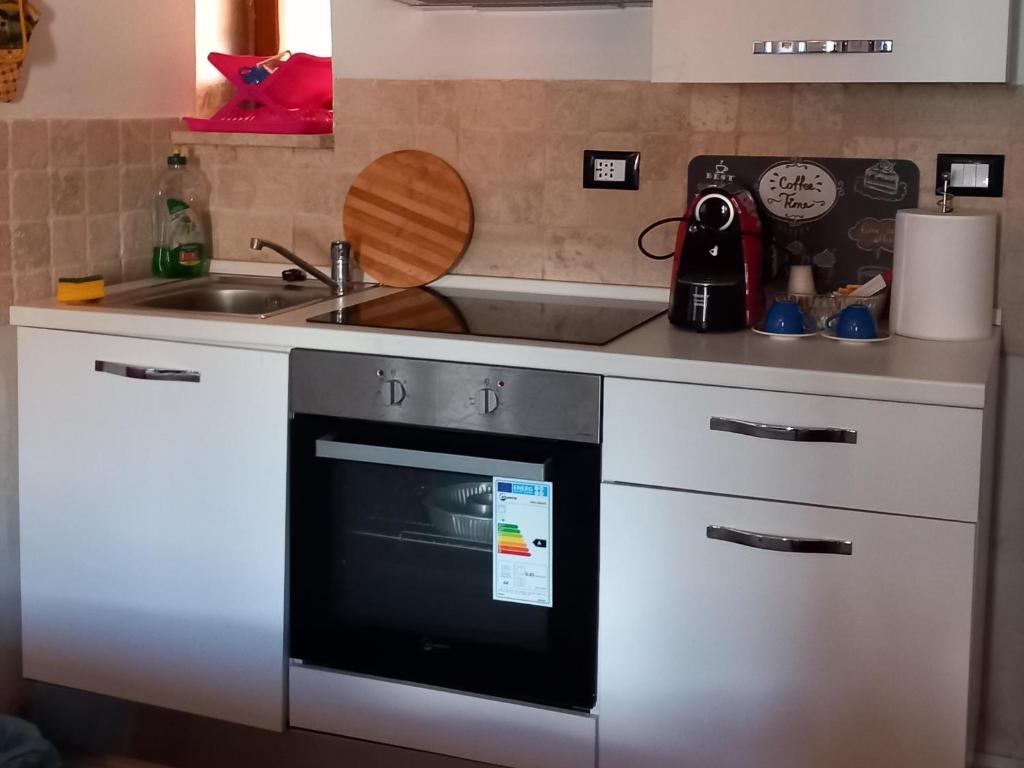 A kitchen or kitchenette at Casetta papacqua