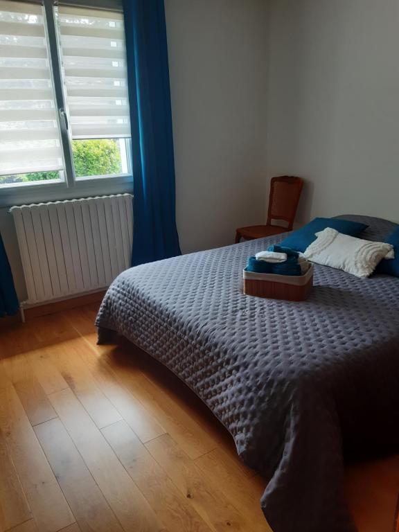 Posteľ alebo postele v izbe v ubytovaní Chambre à 5 minutes du circuit