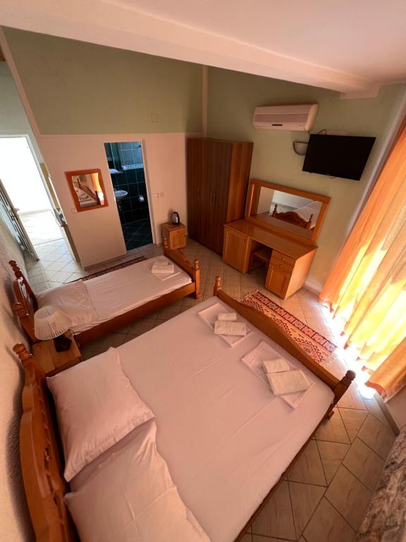 Ένα ή περισσότερα κρεβάτια σε δωμάτιο στο Apartments Amina