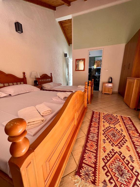 Ένα ή περισσότερα κρεβάτια σε δωμάτιο στο Apartments Amina