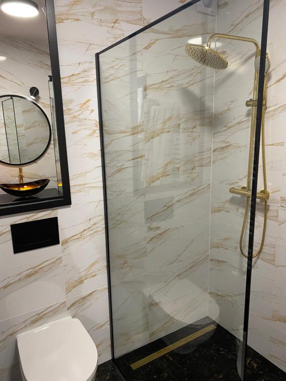 Koupelna v ubytování Apartament na Spokojnej