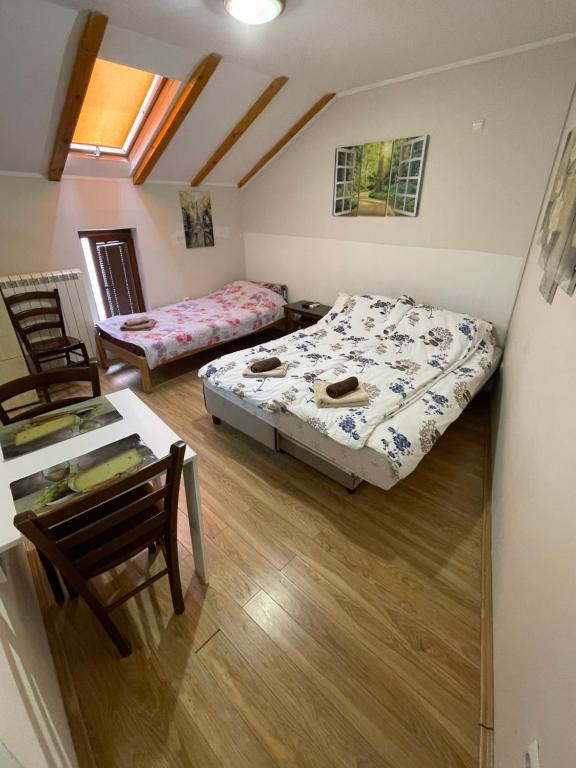 Postel nebo postele na pokoji v ubytování Bulevar Apartments