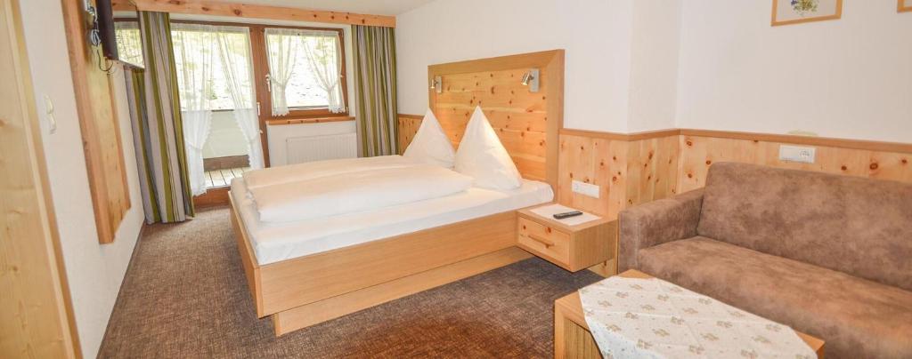 Кровать или кровати в номере Pension Wendlhof