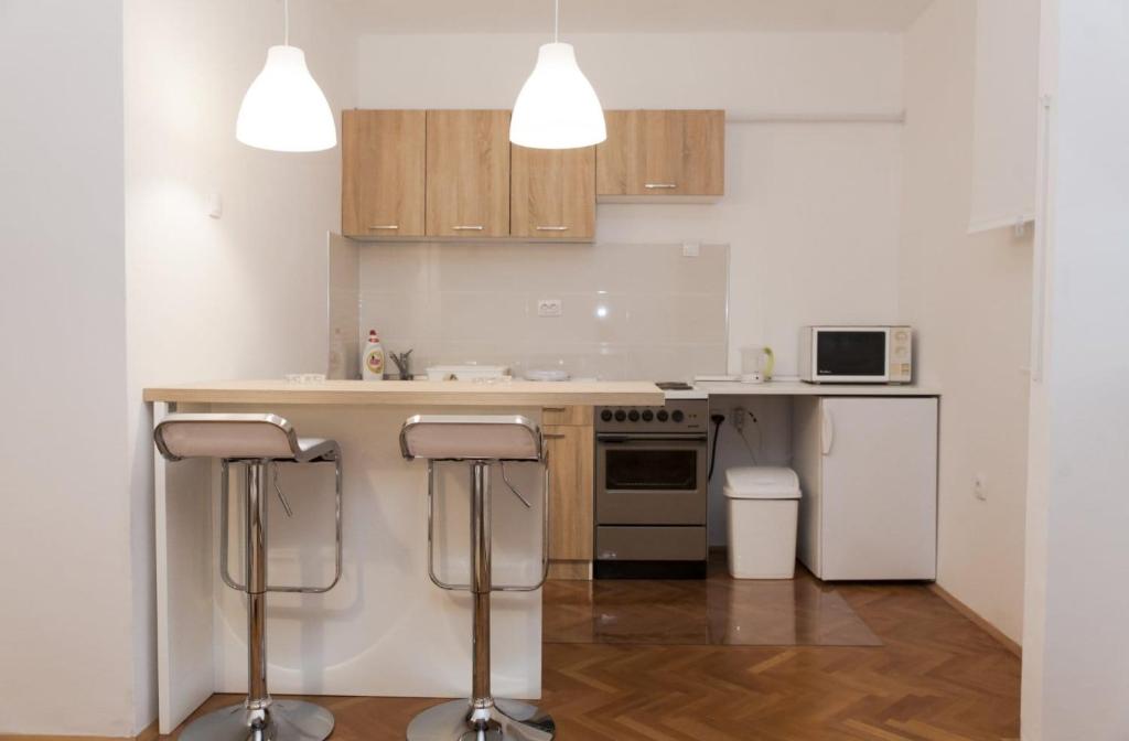Kjøkken eller kjøkkenkrok på Dorcol Apartman