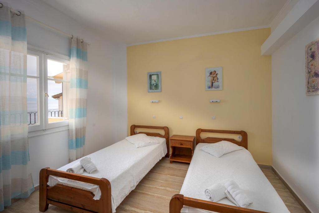 Postel nebo postele na pokoji v ubytování El Greco hotel by Estia