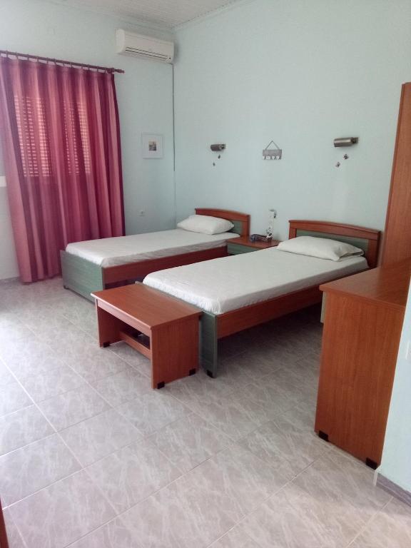 Postel nebo postele na pokoji v ubytování Panorama Rooms
