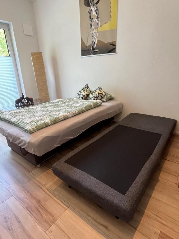 Postel nebo postele na pokoji v ubytování Ferienwohnung "Moseltraum" Ensch