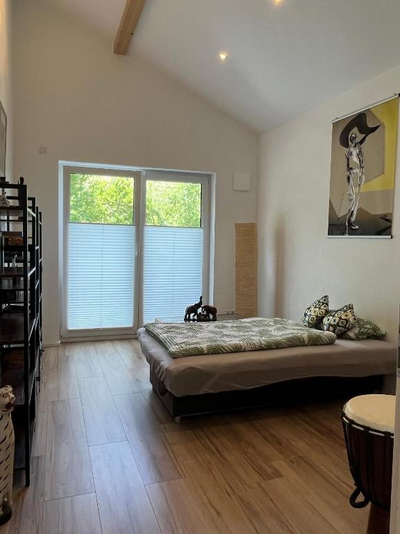Postel nebo postele na pokoji v ubytování Ferienwohnung "Moseltraum" Ensch