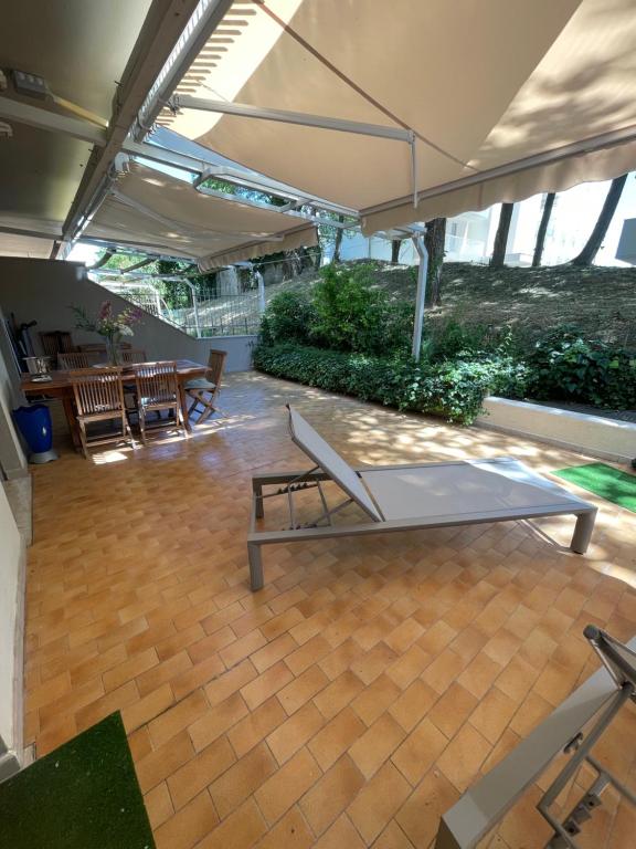 a ping pong table in the middle of a room at Casa Roberta con favolosa terrazza privata in Caorle