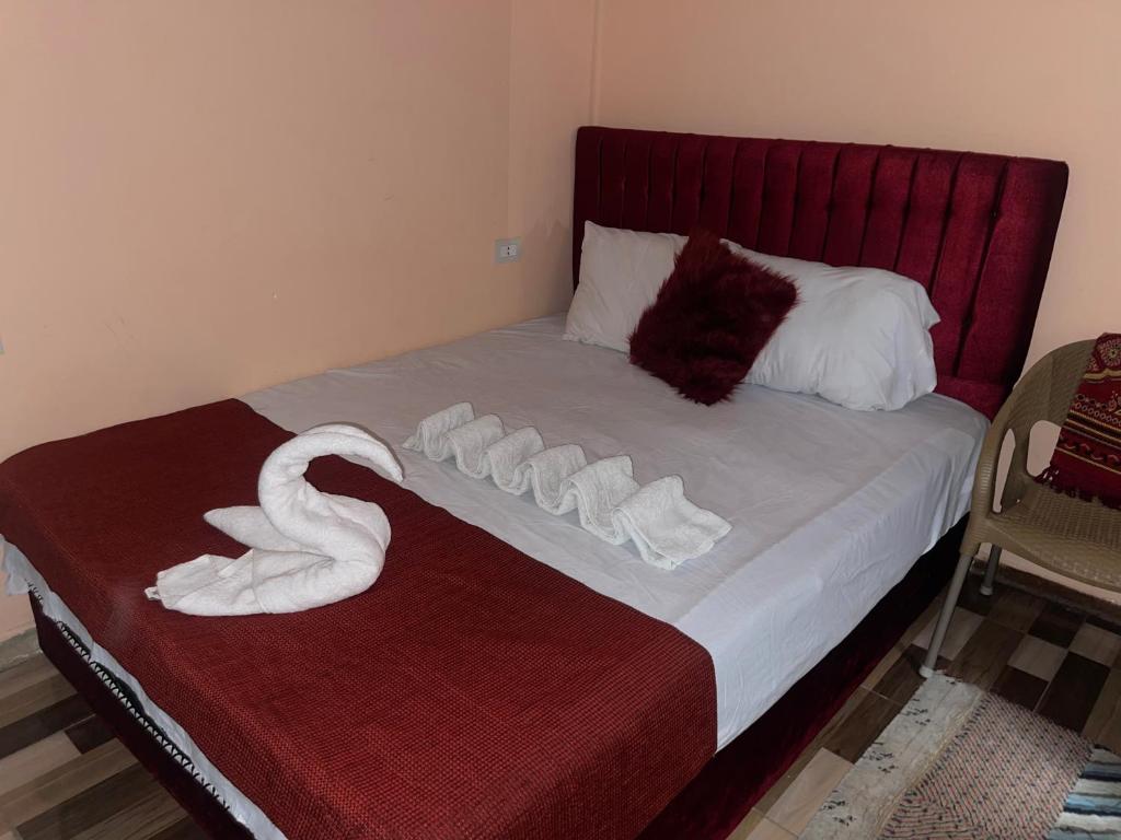 Postel nebo postele na pokoji v ubytování New One Hotel