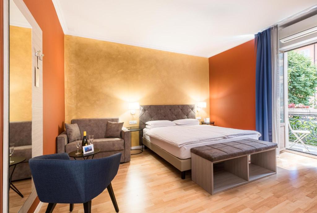 Postel nebo postele na pokoji v ubytování Hotel Zurigo Downtown