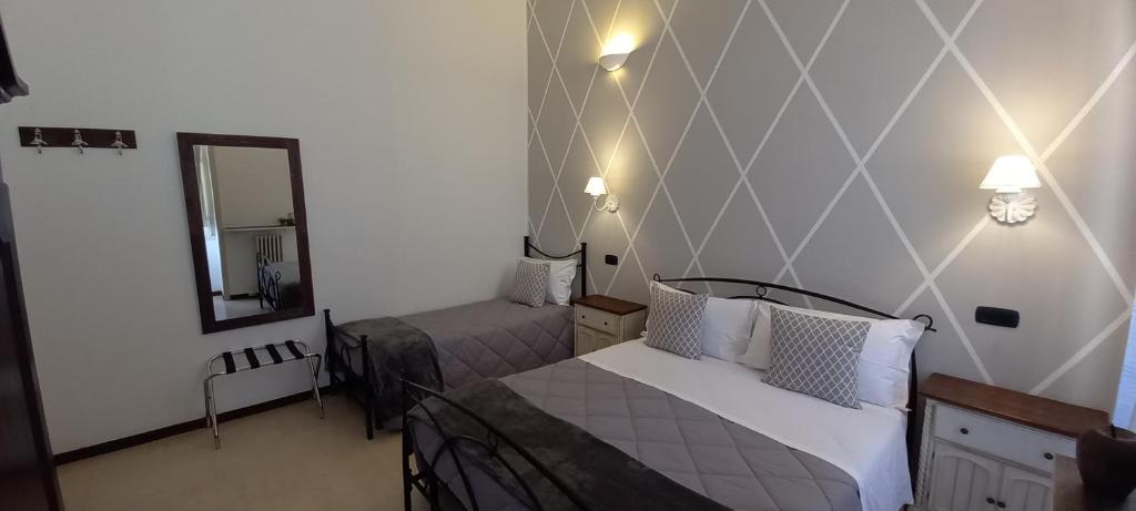 Postel nebo postele na pokoji v ubytování B&B Acanto Lecce