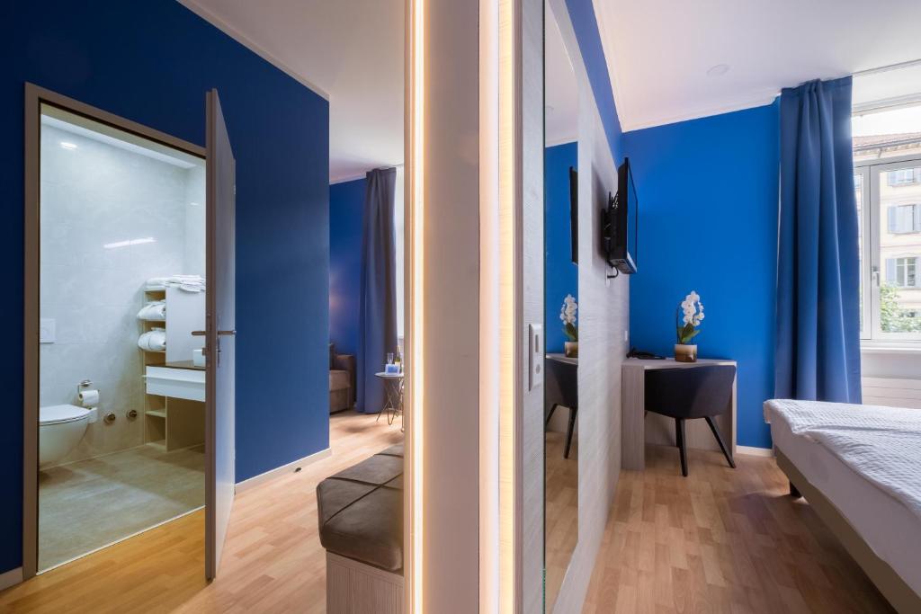 Postel nebo postele na pokoji v ubytování Hotel Zurigo Downtown
