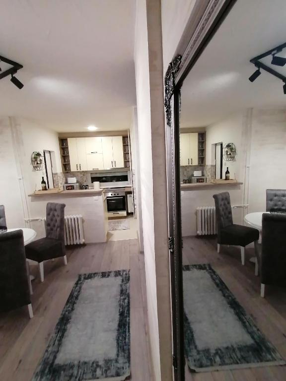 Kuchyň nebo kuchyňský kout v ubytování JM Apartman