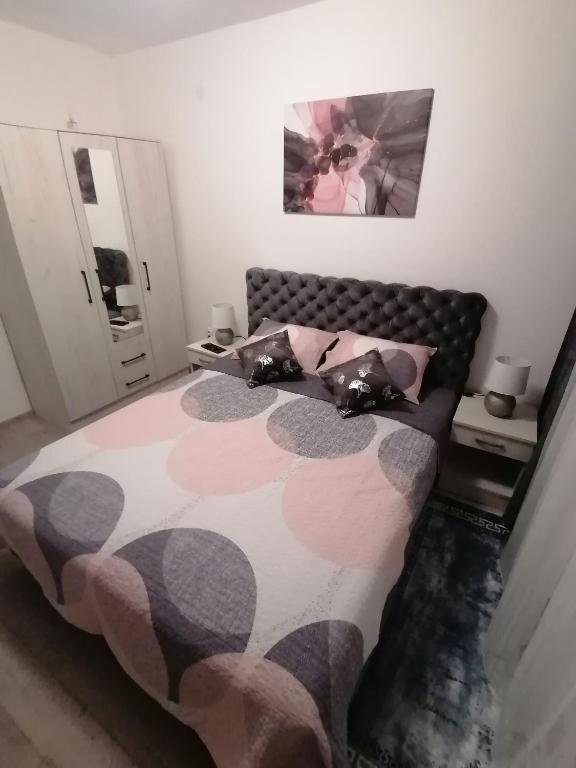 Postel nebo postele na pokoji v ubytování JM Apartman