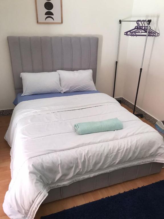 Postel nebo postele na pokoji v ubytování Akwaba lodge