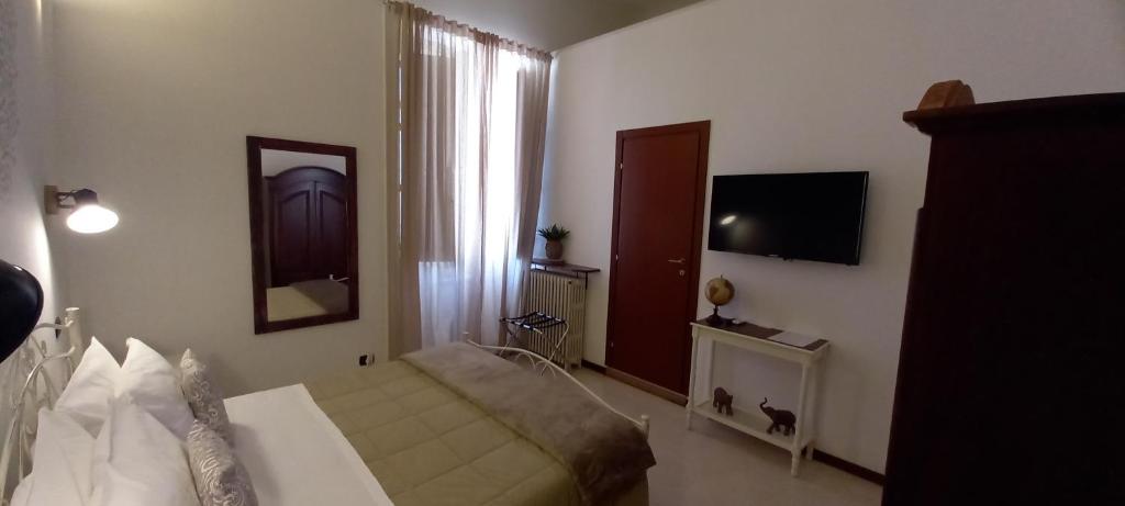 TV a/nebo společenská místnost v ubytování B&B Acanto Lecce