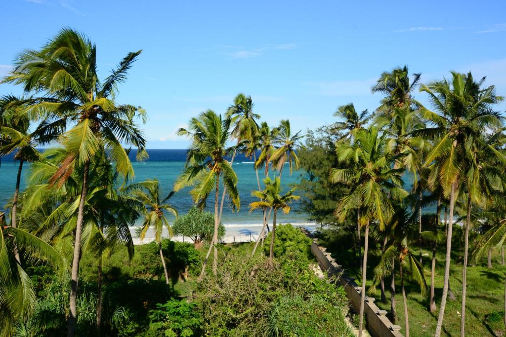 a view of the beach from the resort at Zanoceanique Hotel in Matemwe