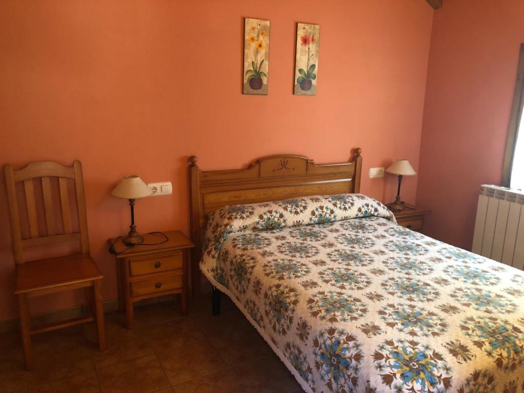 Postel nebo postele na pokoji v ubytování apartamentos casa botero