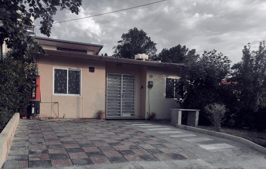 a house with a garage and a driveway at QB Elegant Villa Bahria Town in Rawalpindi