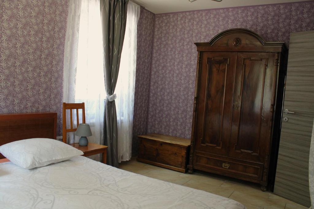 Postel nebo postele na pokoji v ubytování Apartment Dandelion