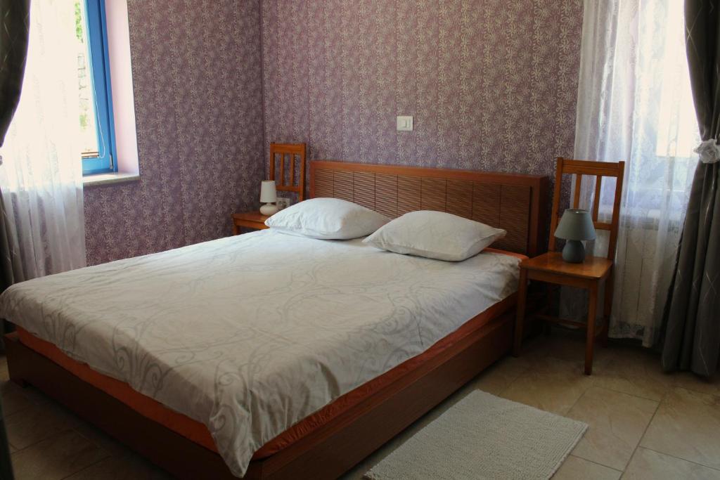 Postel nebo postele na pokoji v ubytování Apartment Dandelion