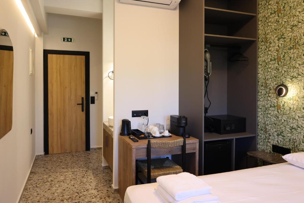 TV a/nebo společenská místnost v ubytování Uphill Unique Boutique Suites