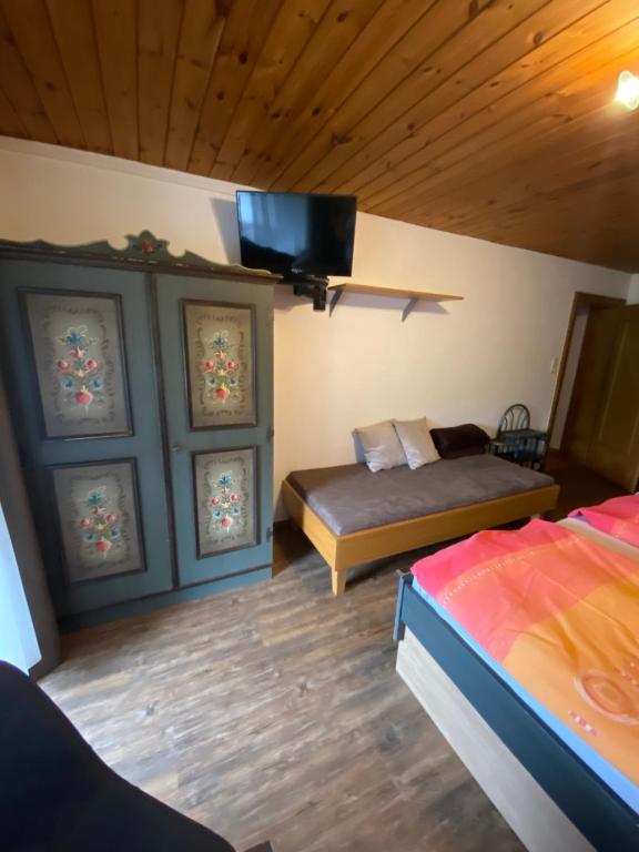Postel nebo postele na pokoji v ubytování Landhaus Aigner
