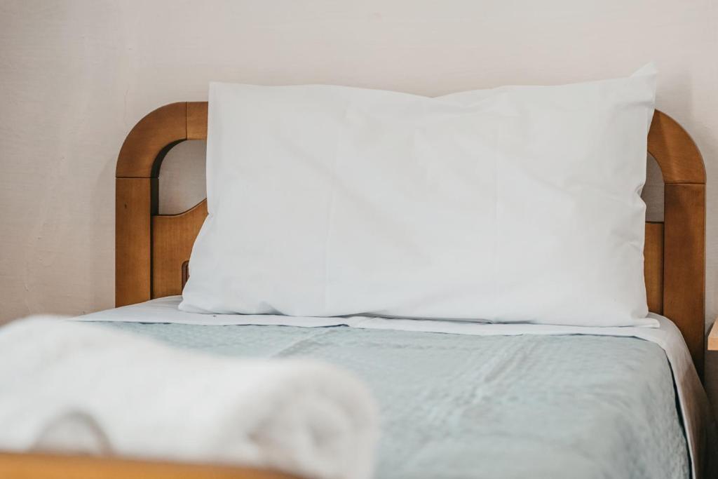 Postel nebo postele na pokoji v ubytování Guest House Edmond