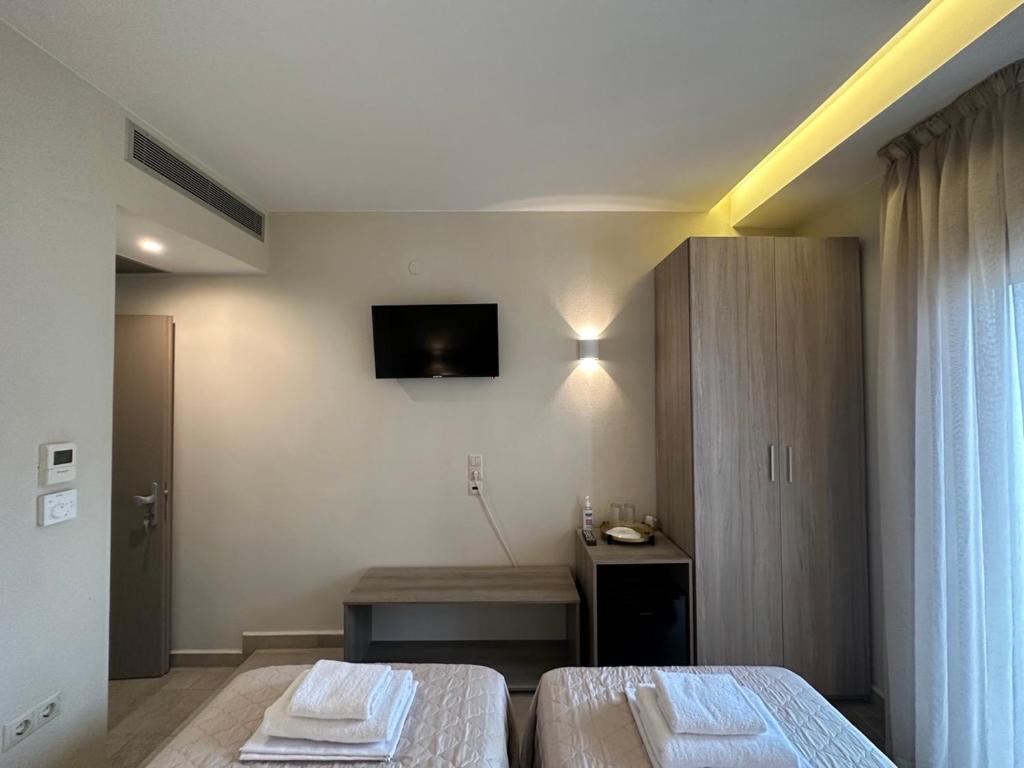 Postel nebo postele na pokoji v ubytování Yulia Luxury Apartments