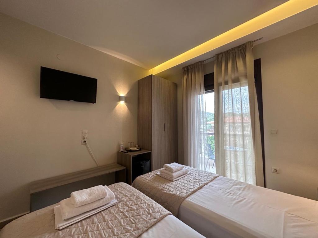 Postel nebo postele na pokoji v ubytování Yulia Luxury Apartments