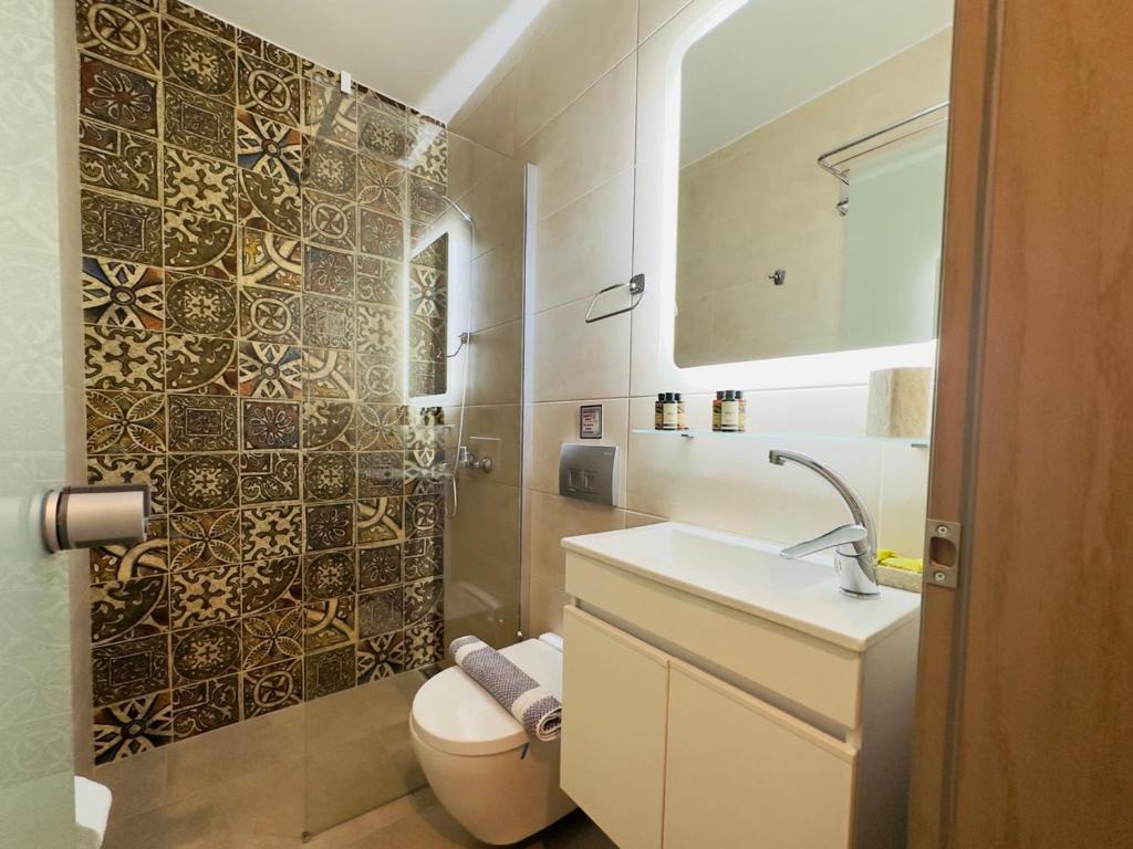 Koupelna v ubytování Yulia Luxury Apartments