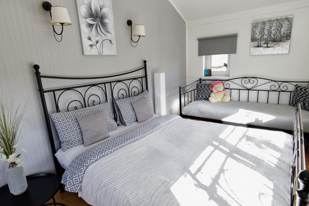 Posteľ alebo postele v izbe v ubytovaní Apartman Lastovicka
