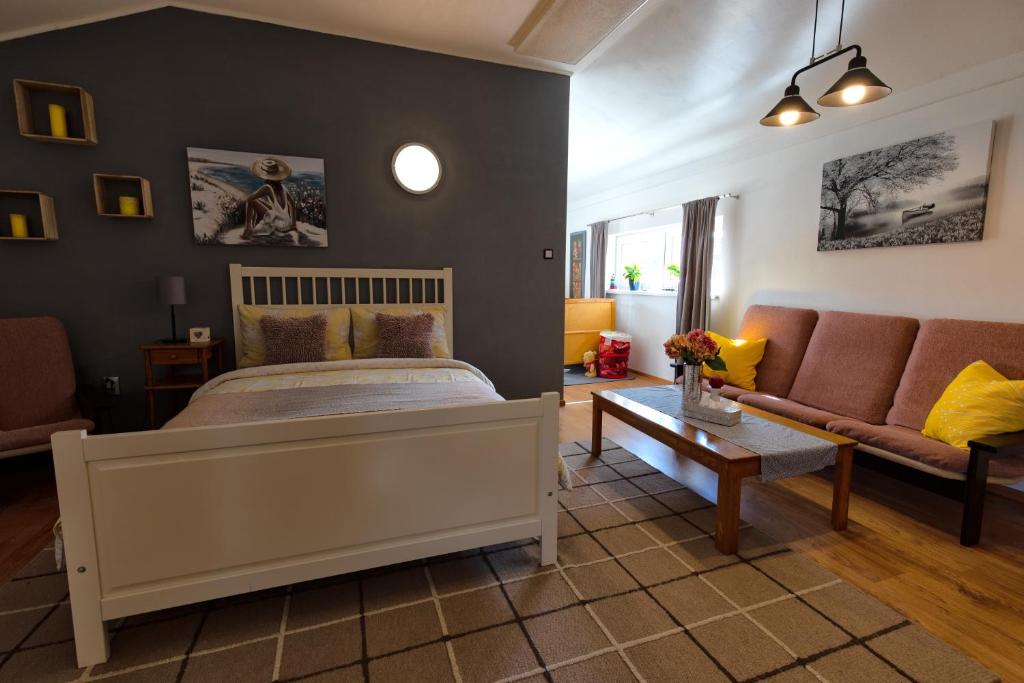 Posteľ alebo postele v izbe v ubytovaní Apartman Lastovicka