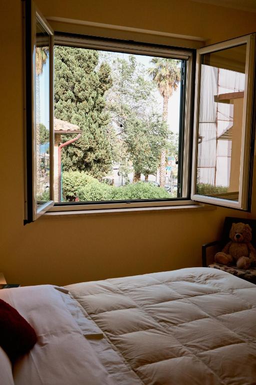 Łóżko lub łóżka w pokoju w obiekcie Discover Tortoreto