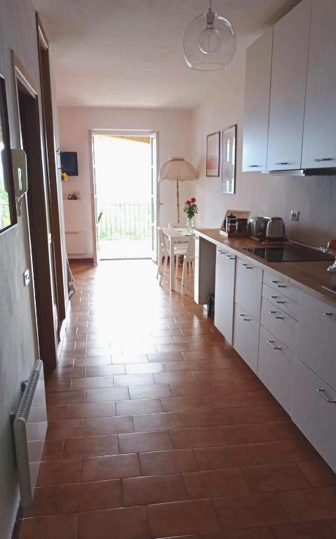Kuchyň nebo kuchyňský kout v ubytování IL BALCONE SUL LAGO