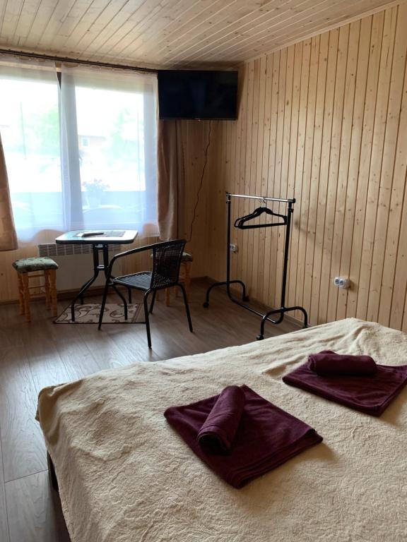 Postel nebo postele na pokoji v ubytování VV