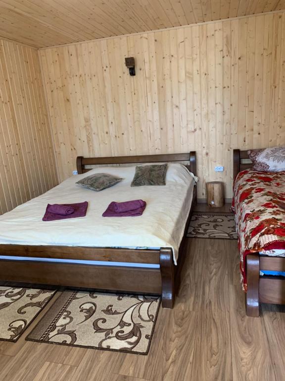 Postel nebo postele na pokoji v ubytování VV