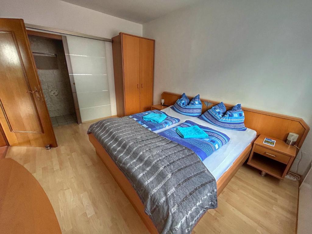 Postel nebo postele na pokoji v ubytování Panorama Apartments Semslach