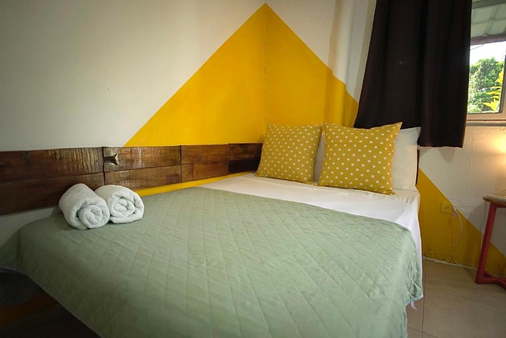 Una cama o camas en una habitación de Kilian