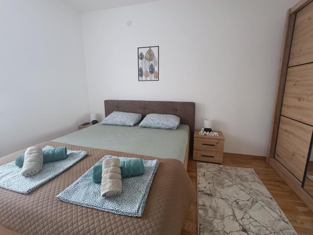 Postel nebo postele na pokoji v ubytování Apartment Eight - Pirot