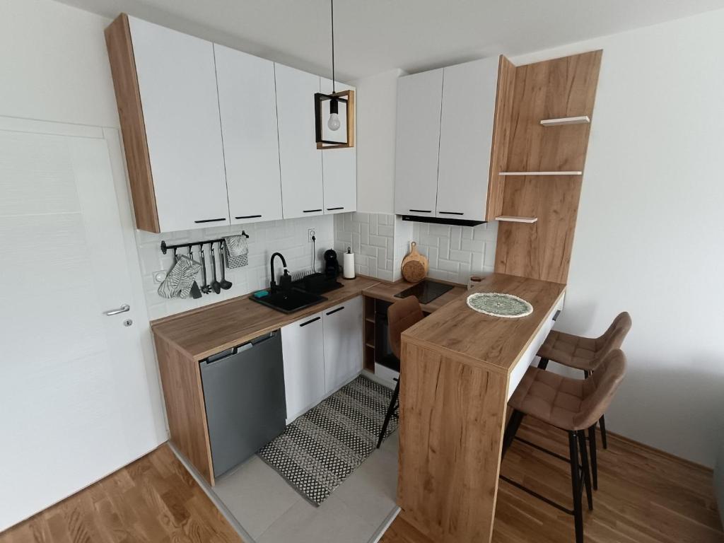Kuchyň nebo kuchyňský kout v ubytování Apartment Eight - Pirot