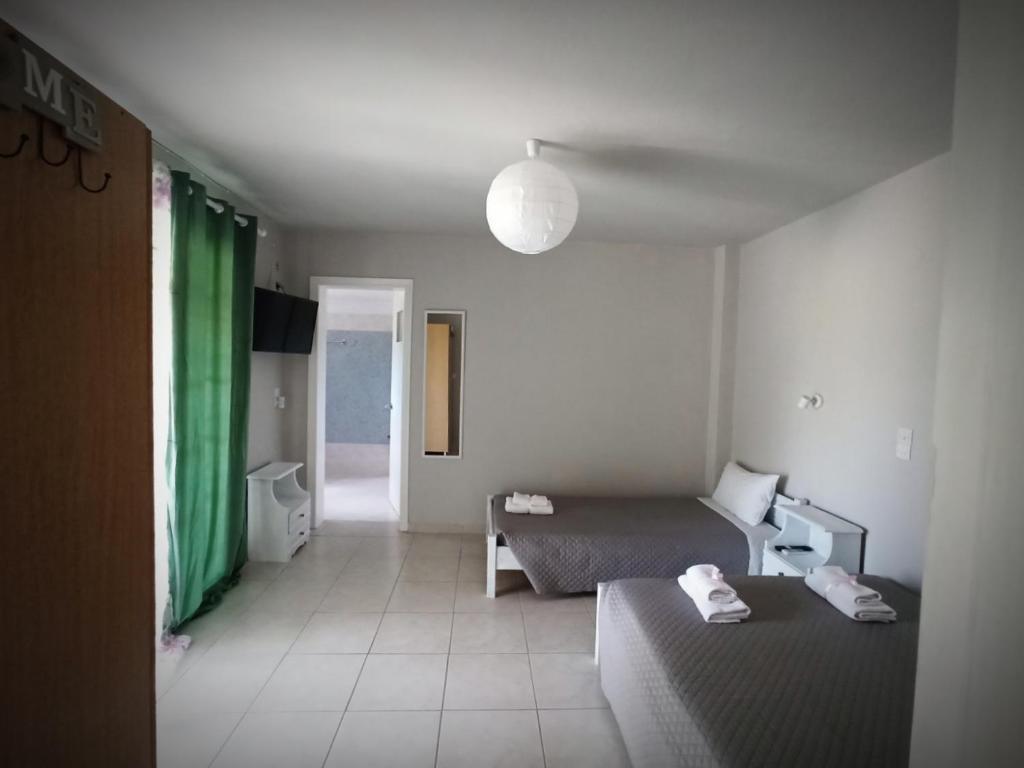 Postel nebo postele na pokoji v ubytování Demis Apartments