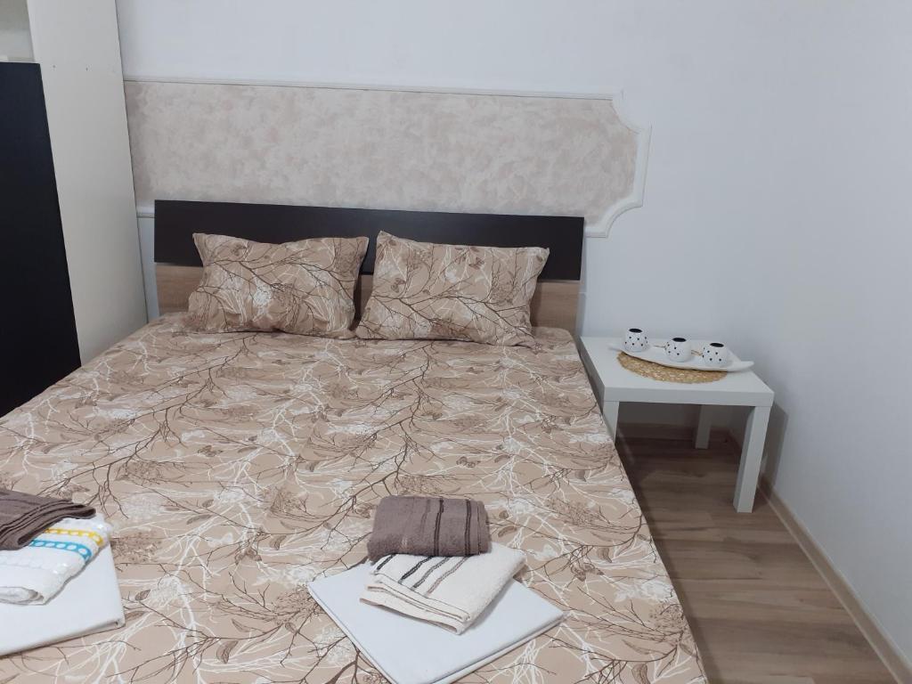 Postel nebo postele na pokoji v ubytování Apartmani "Helena"