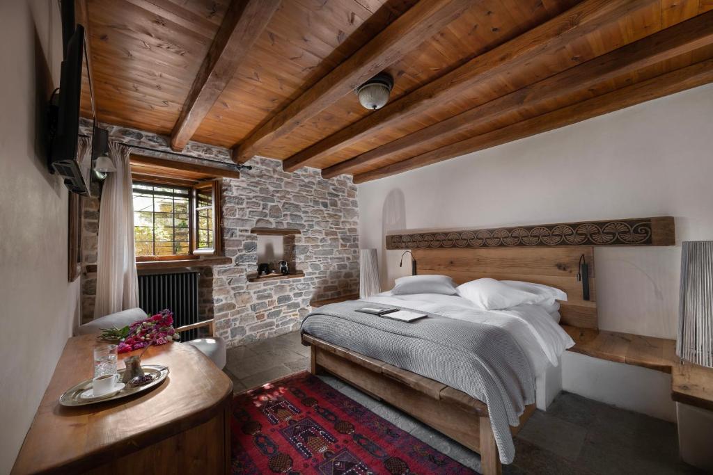 Postel nebo postele na pokoji v ubytování Sakali Mansion